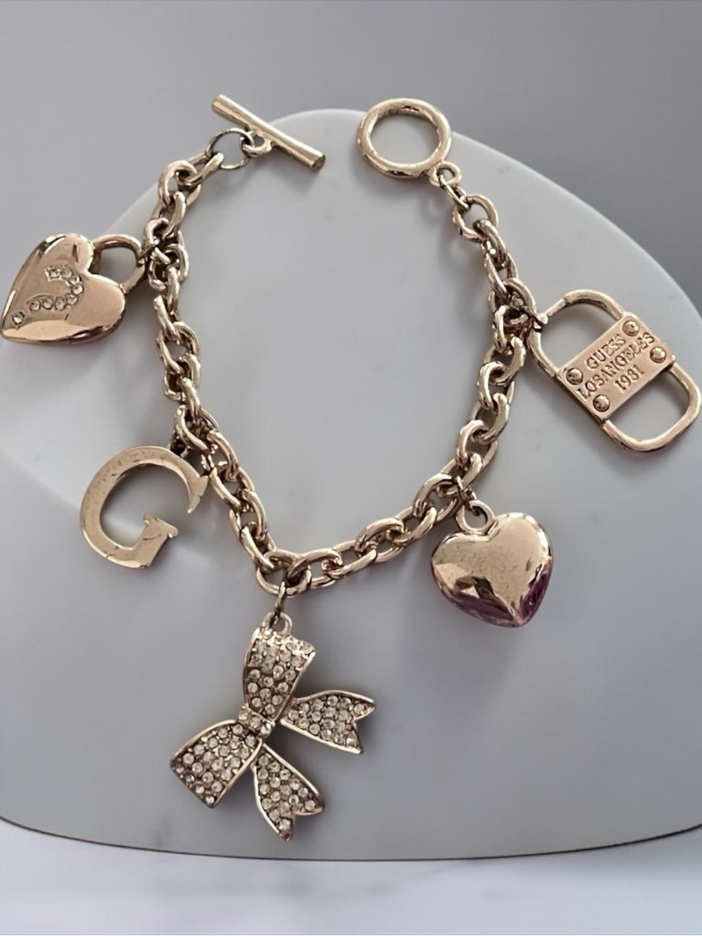 Guess Gold-Tone Charm Bracelet with Crystal Bow & Heart Charms